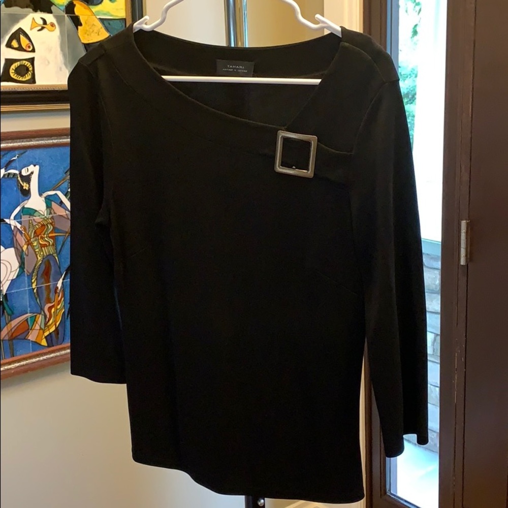 A beautiful classic Tahari- angled neck-tapered